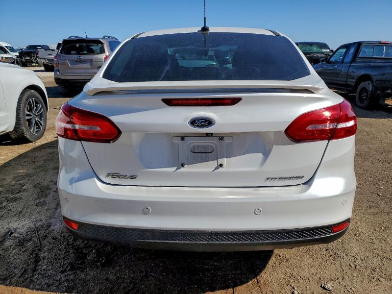 Photo 6 from auction – 2017 FORD FOCUS TITA with VIN 1FADP3J20HL284065