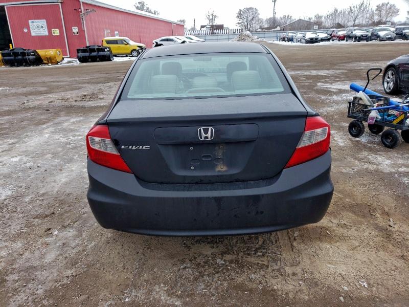 Photo 6 from auction – 2012 HONDA CIVIC LX with VIN 2HGFB2F41CH049865