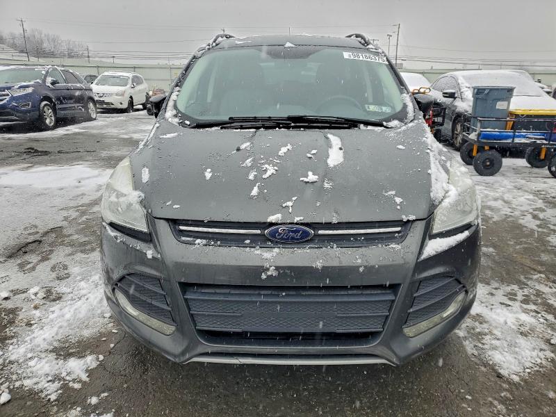 Photo 5 from auction – 2016 FORD ESCAPE SE with VIN 1FMCU9GX7GUC72424