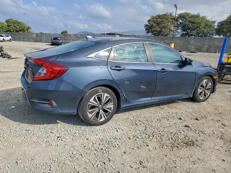 Photo 3 from auction – 2017 HONDA CIVIC EX with VIN 2HGFC1F32HH640356