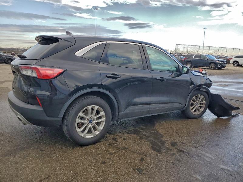 Photo 3 from auction – 2021 FORD ESCAPE SE with VIN 1FMCU0G64MUA84054