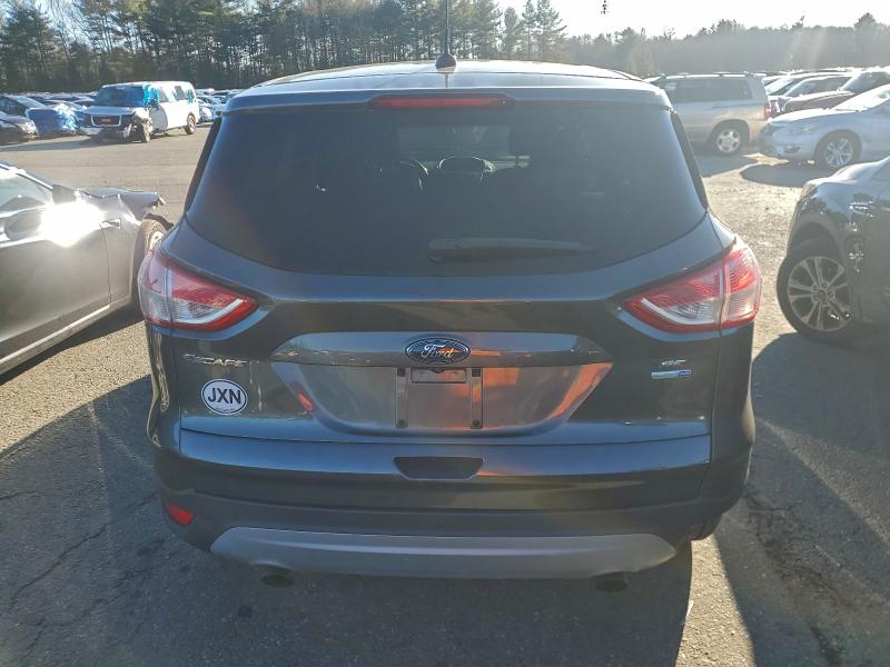 Photo 6 from auction – 2015 FORD ESCAPE SE with VIN 1FMCU9GX4FUC84352