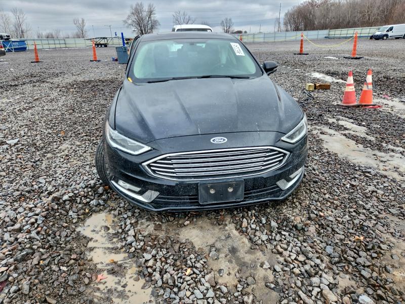 Photo 5 from auction – 2017 FORD FUSION SE with VIN 3FA6P0HD6HR340395