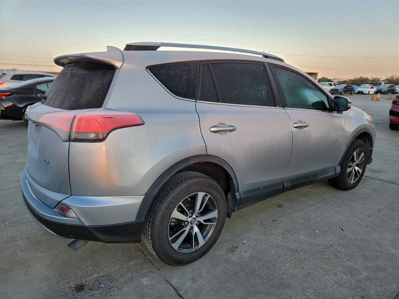 Photo 3 from auction – 2017 TOYOTA RAV4 XLE with VIN 2T3WFREV4HW369906