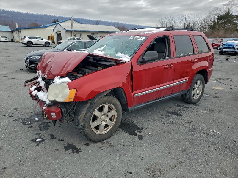 JEEP GRAND CHER 2010 with VIN 1J4PR4GK5AC151798 - Photo from auction