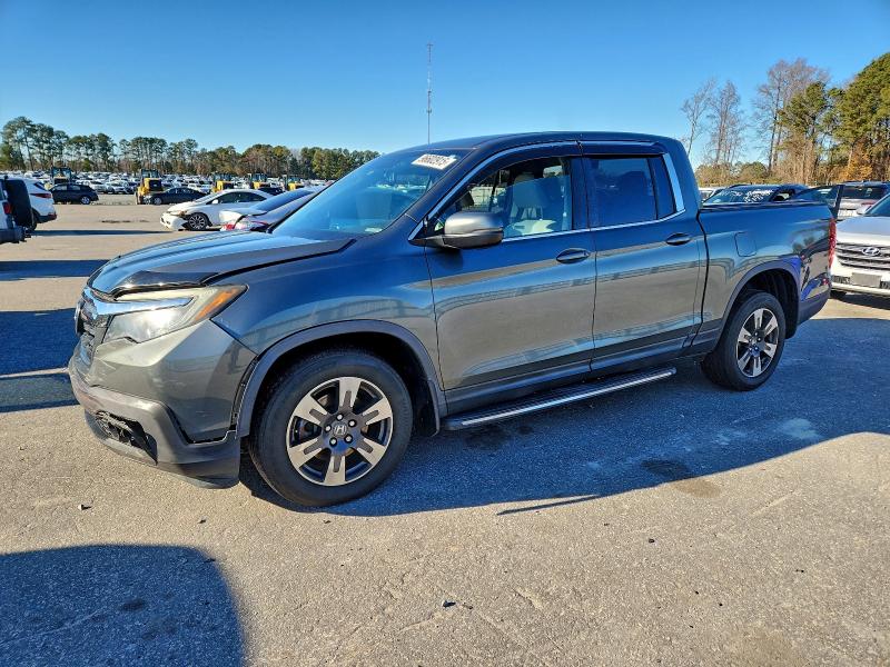HONDA RIDGELINE 2017 with VIN 5FPYK3F64HB023585 - Photo from auction