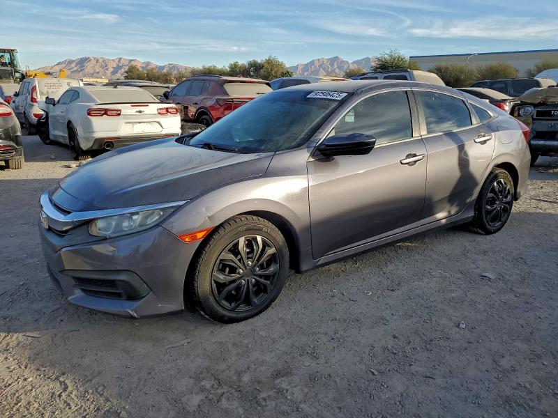Photo 1 from auction – 2018 HONDA CIVIC LX with VIN 2HGFC2F52JH504466