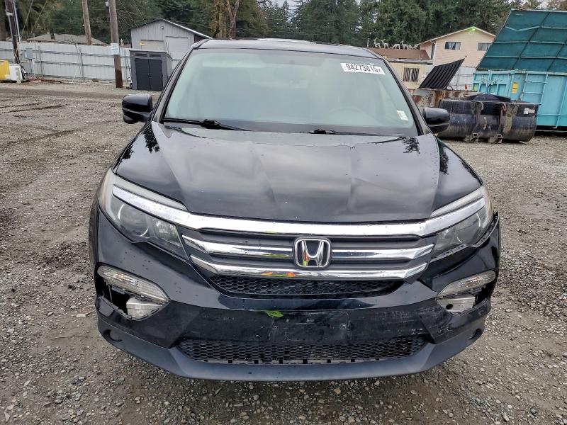 Photo 5 from auction – 2016 HONDA PILOT EXL with VIN 5FNYF6H55GB079858