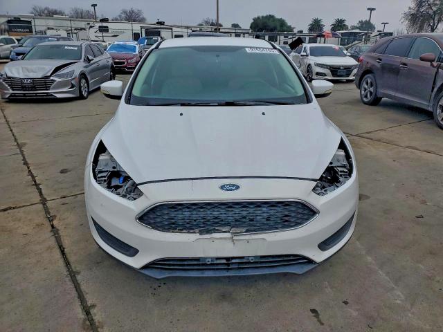 Photo 5 from auction – 2015 FORD FOCUS SE with VIN 1FADP3F21FL300800