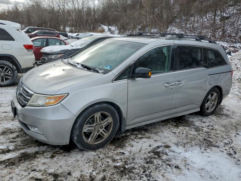 HONDA ODYSSEY TO 2012 with VIN 5FNRL5H96CB147833 - Photo from auction
