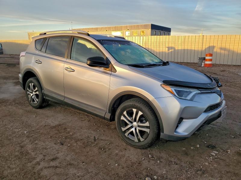 Photo 4 from auction – 2016 TOYOTA RAV4 LE with VIN 2T3BFREV4GW493820