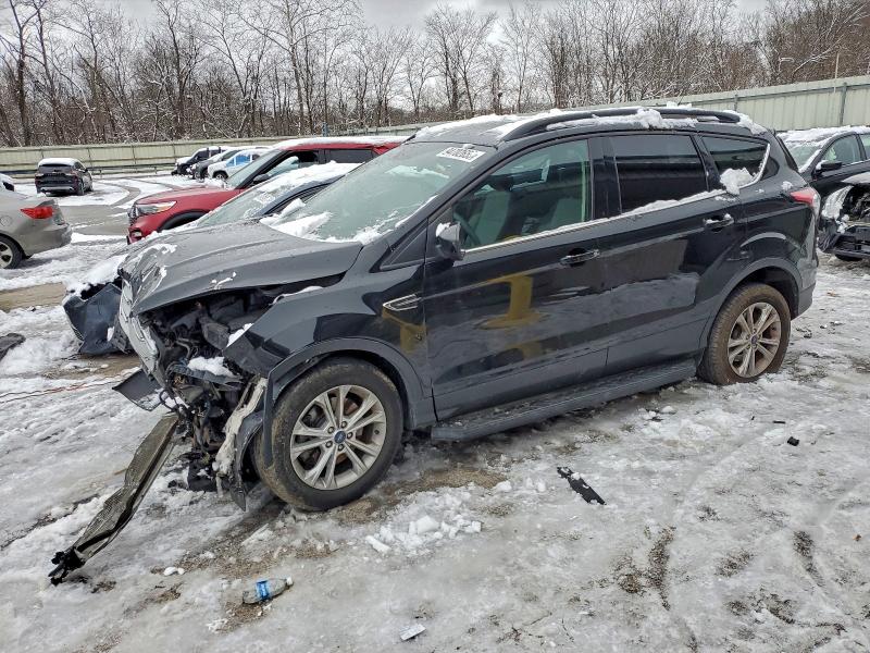 FORD ESCAPE SE 2018 with VIN 1FMCU9GD1JUB38649 - Photo from auction