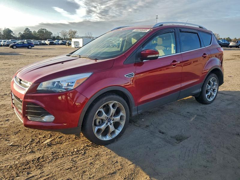 FORD ESCAPE TIT 2016 with VIN 1FMCU9J96GUC50277 - Photo from auction