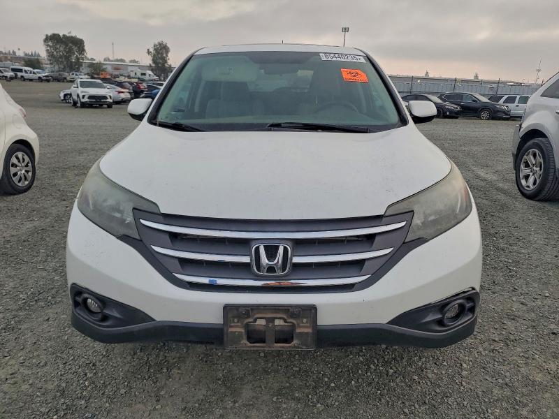 Photo 5 from auction – 2014 HONDA CR-V EX with VIN 5J6RM4H55EL042991