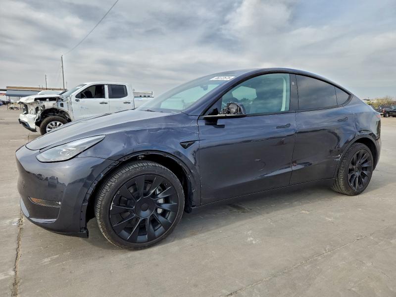 TESLA MODEL Y 2025 with VIN 7SAYGDEE0SA342305 - Photo from auction