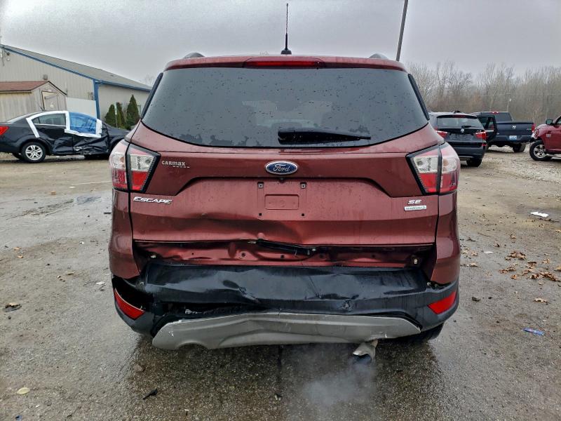 Photo 6 from auction – 2018 FORD ESCAPE SE with VIN 1FMCU0GD1JUC29450