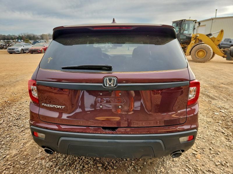 Photo 6 from auction – 2021 HONDA PASSPORT E with VIN 5FNYF7H50MB001456