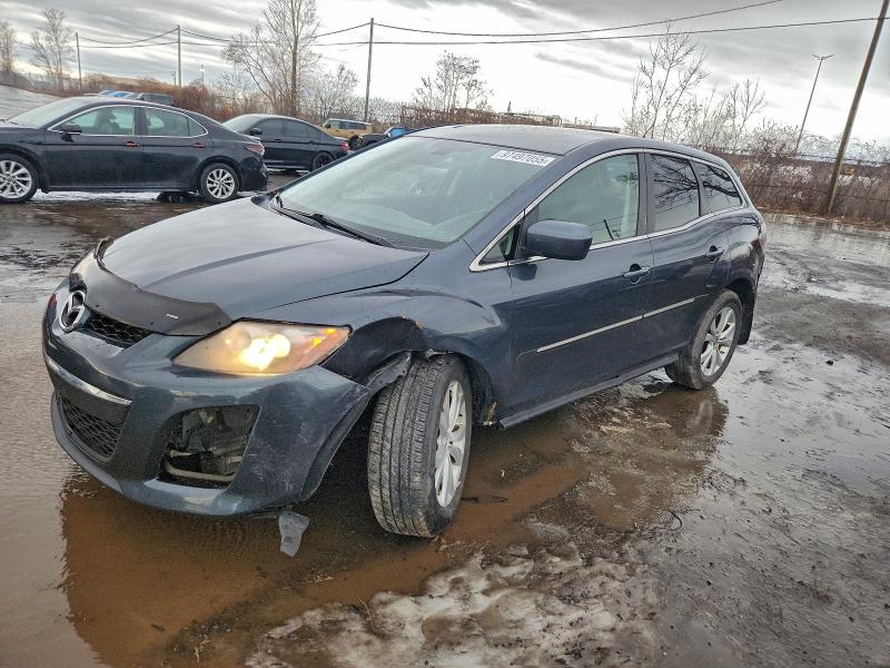 MAZDA CX-7 2011 with VIN JM3ER4C34B0383797 - Photo from auction