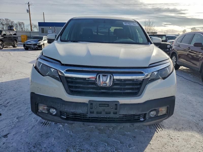 Photo 5 from auction – 2019 HONDA RIDGELINE with VIN 5FPYK3F64KB001352