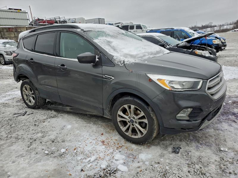 Photo 4 from auction – 2018 FORD ESCAPE SE with VIN 1FMCU0GD3JUA92625