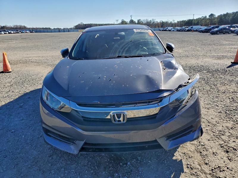 Photo 5 from auction – 2018 HONDA CIVIC LX with VIN 19XFC2F57JE033134
