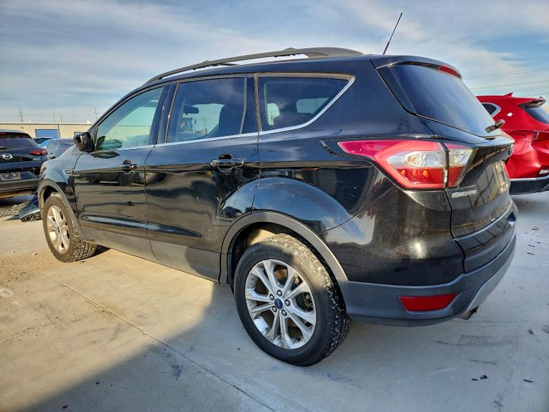 Photo 2 from auction – 2018 FORD ESCAPE SE with VIN 1FMCU9GD7JUA97931