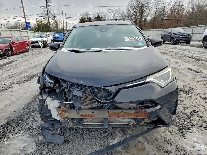 Photo 5 from auction – 2018 TOYOTA RAV4 LE with VIN 2T3BFREV2JW727492