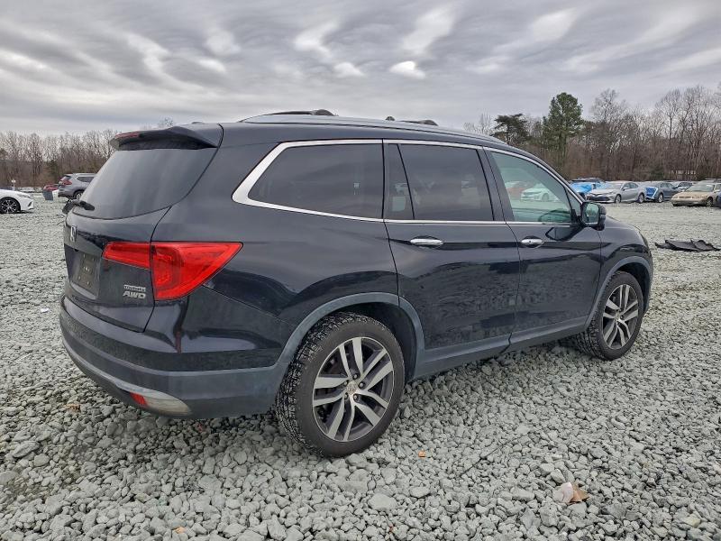Photo 3 from auction – 2016 HONDA PILOT TOUR with VIN 5FNYF6H93GB071616