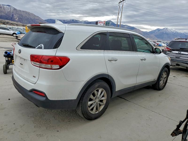 Photo 3 from auction – 2016 KIA SORENTO LX with VIN 5XYPGDA35GG075968
