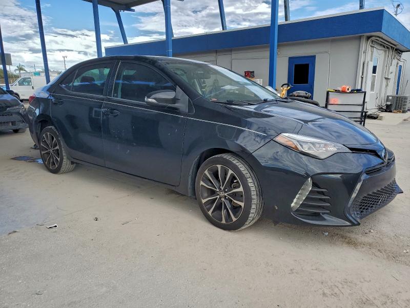 Photo 4 from auction – 2017 TOYOTA COROLLA L with VIN 2T1BURHE3HC810869