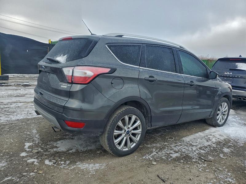 Photo 3 from auction – 2017 FORD ESCAPE with VIN 1FMCU0JD0HUD51865