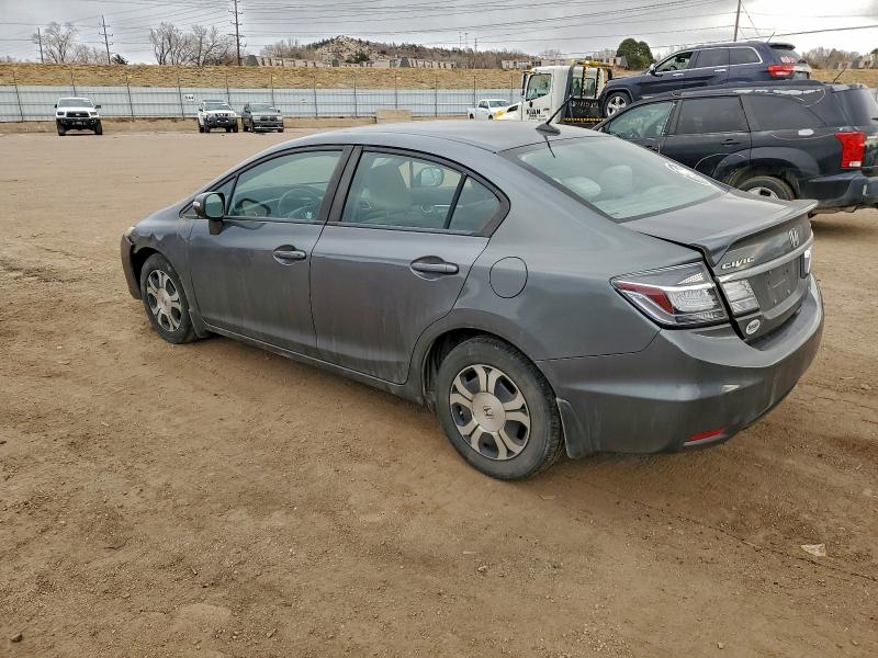 Photo 2 from auction – 2013 HONDA CIVIC HYBR with VIN 19XFB4F20DE001828