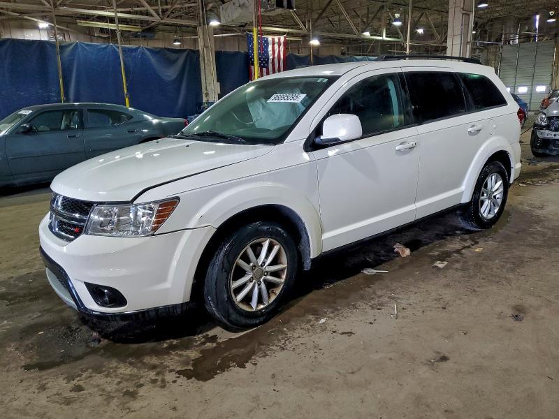 DODGE JOURNEY 2015 with VIN 3C4PDCBB2FT586991 - Photo from auction