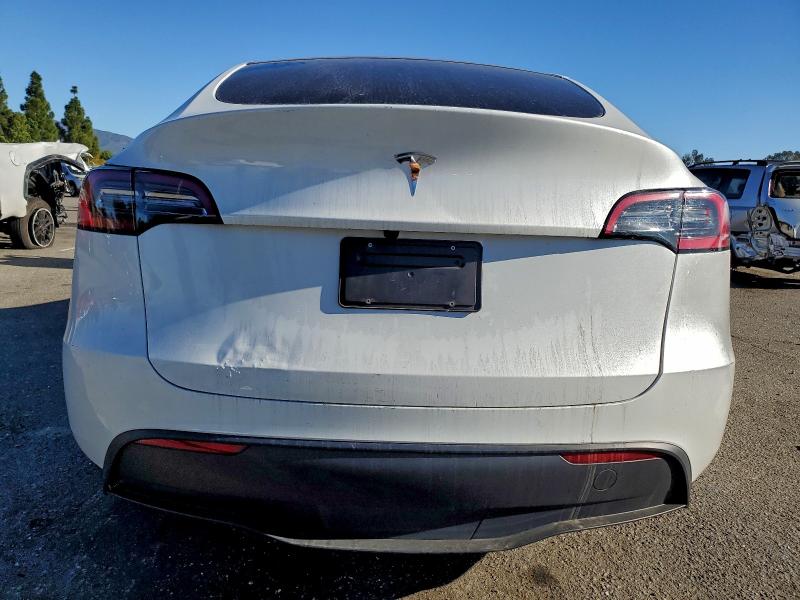 Photo 6 from auction – 2023 TESLA MODEL Y with VIN 7SAYGDED4PF965329