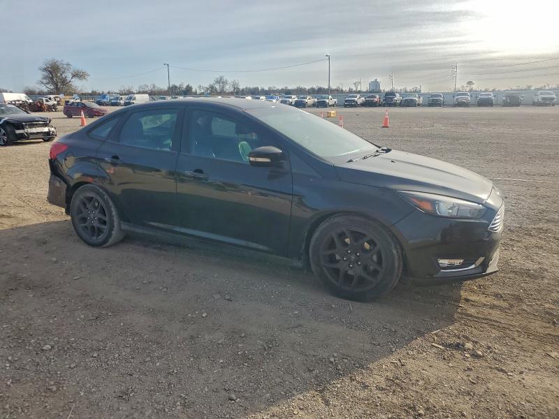 Photo 4 from auction – 2016 FORD FOCUS SE with VIN 1FADP3F28GL326411