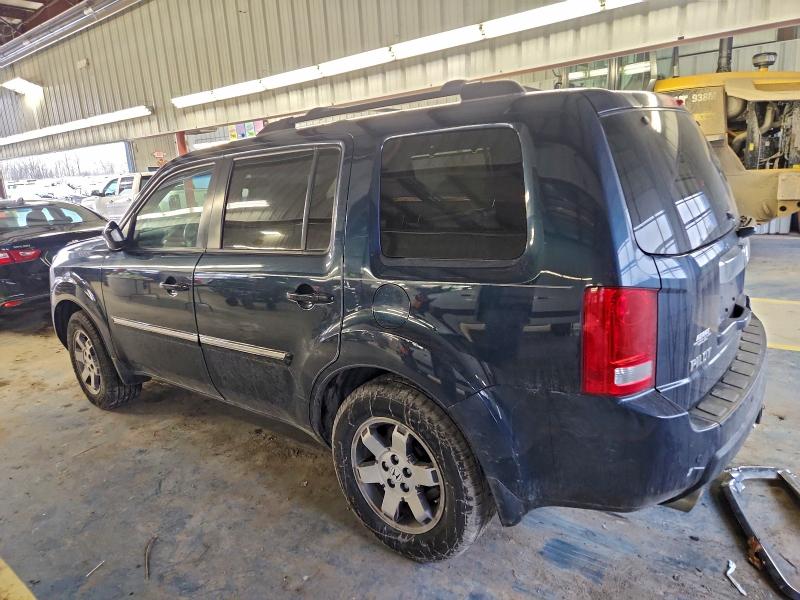 Photo 2 from auction – 2011 HONDA PILOT TOUR with VIN 5FNYF4H95BB011091