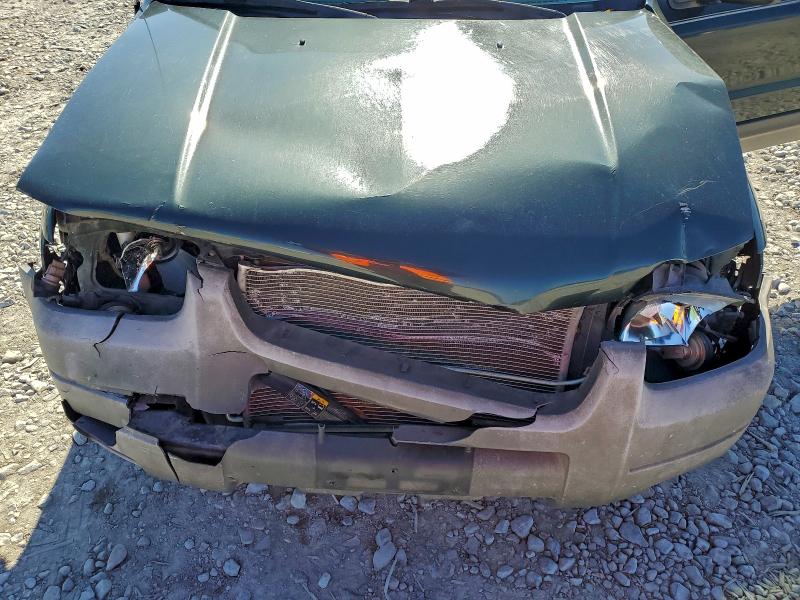 Photo 12 from auction – 2003 FORD ESCAPE XLS with VIN 1FMYU02123KB55036