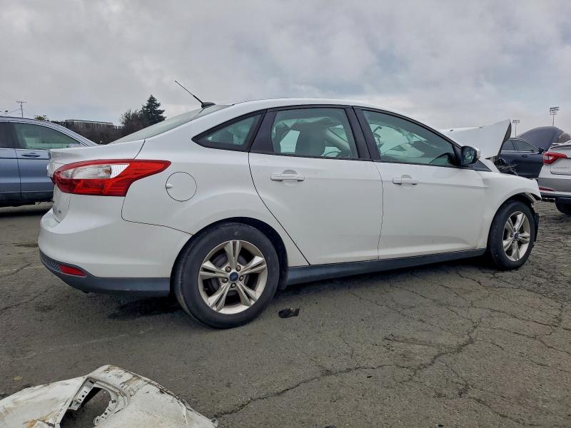 Photo 3 from auction – 2013 FORD FOCUS SE with VIN 1FADP3F26DL302569