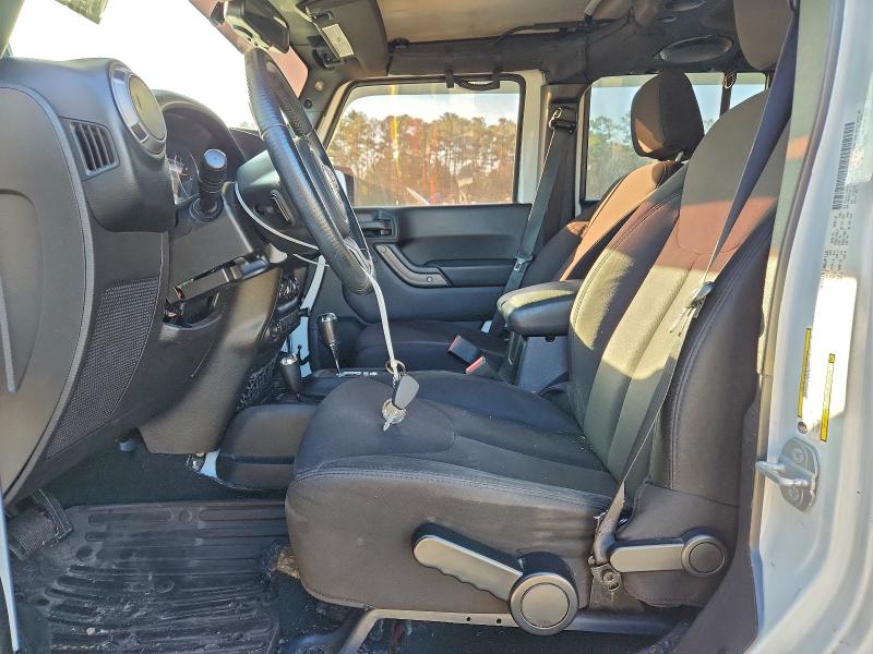 Photo 7 from auction – 2014 JEEP WRANGLER U with VIN 1C4BJWDG6EL159319