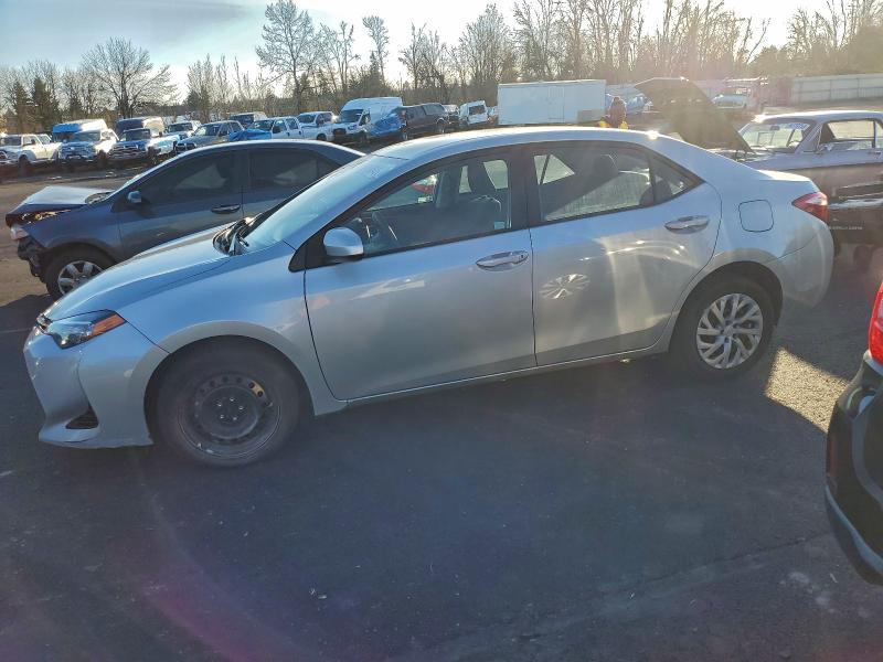 TOYOTA COROLLA L 2017 with VIN 5YFBURHE1HP634405 - Photo from auction