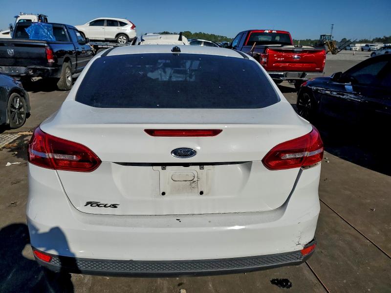 Photo 6 from auction – 2017 FORD FOCUS S with VIN 1FADP3E24HL335481