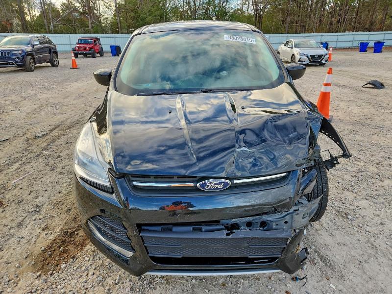Photo 5 from auction – 2015 FORD ESCAPE SE with VIN 1FMCU0G79FUC31710