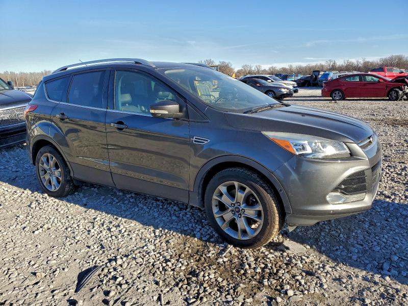 Photo 4 from auction – 2016 FORD ESCAPE TIT with VIN 1FMCU0J99GUA98149