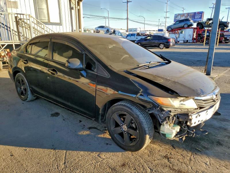Photo 4 from auction – 2012 HONDA CIVIC LX with VIN 19XFB2F54CE379180