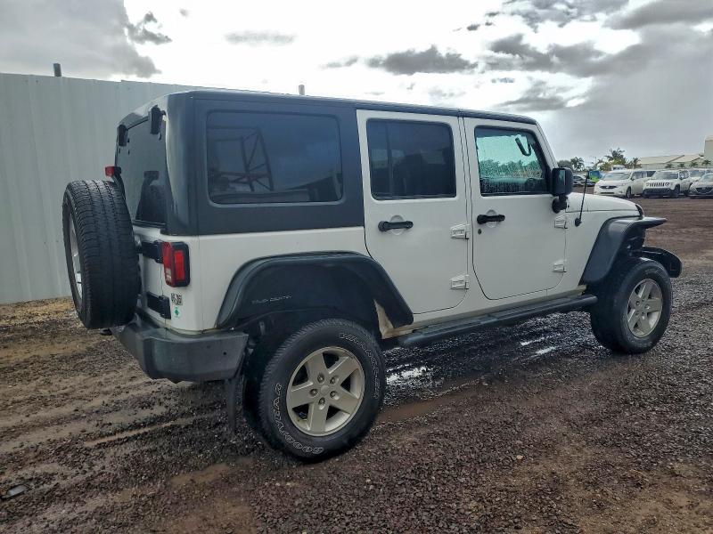 Photo 3 from auction – 2011 JEEP WRANGLER U with VIN 1J4BA3H10BL625532