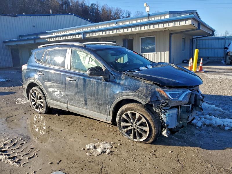 Photo 4 from auction – 2018 TOYOTA RAV4 LIMIT with VIN JTMDFREV4JJ239250