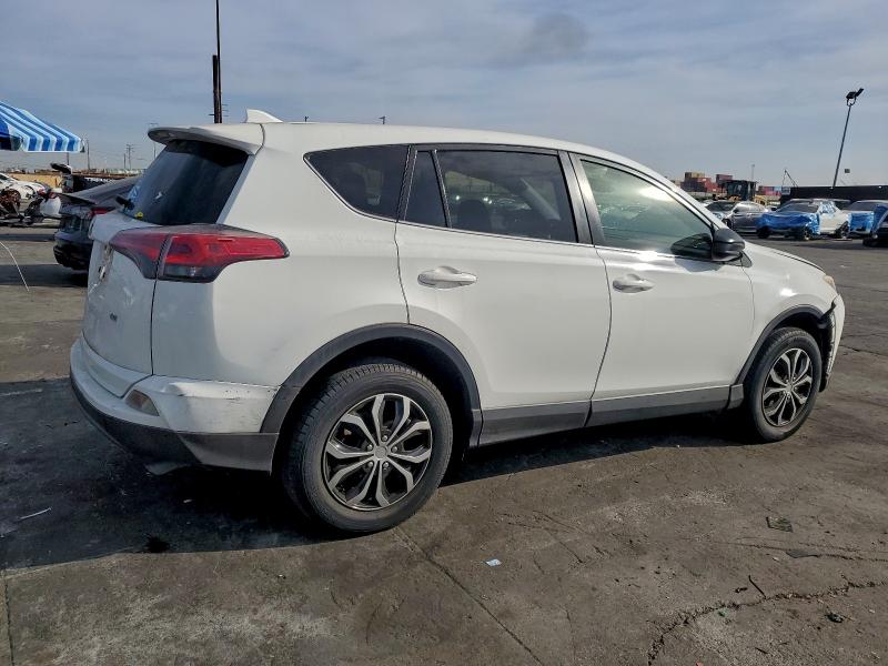 Photo 3 from auction – 2018 TOYOTA RAV4 LE with VIN JTMZFREVXJJ171011