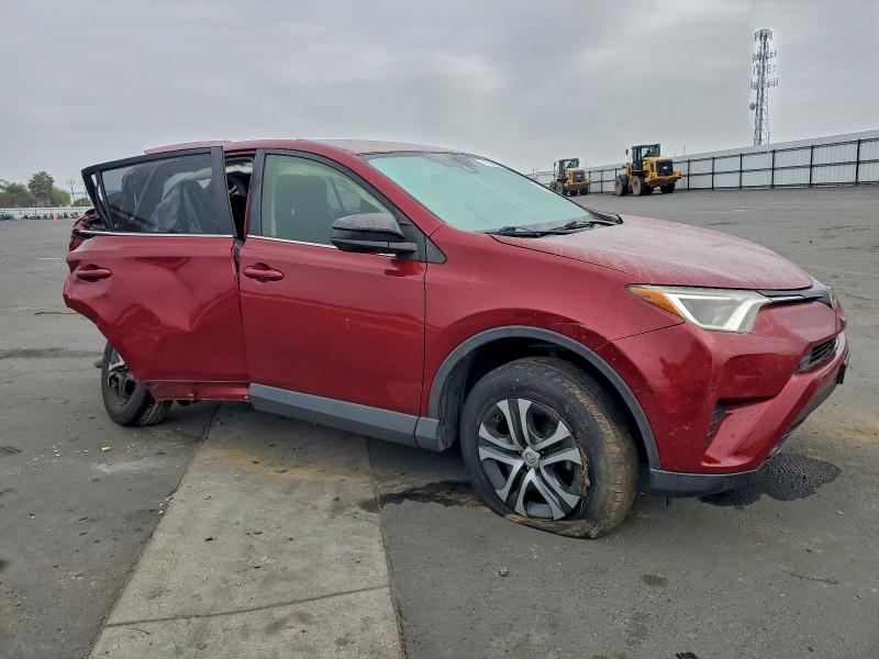 Photo 4 from auction – 2018 TOYOTA RAV4 LE with VIN JTMZFREV7JD112691