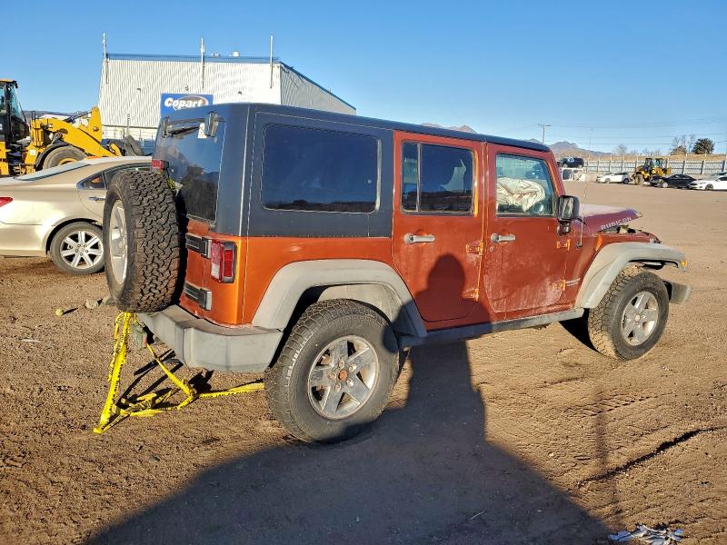 Photo 3 from auction – 2011 JEEP WRANGLER U with VIN 1J4HA6H10BL620391