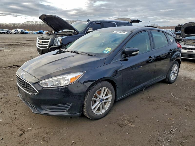 FORD FOCUS SE 2017 with VIN 1FADP3K29HL326523 - Photo from auction